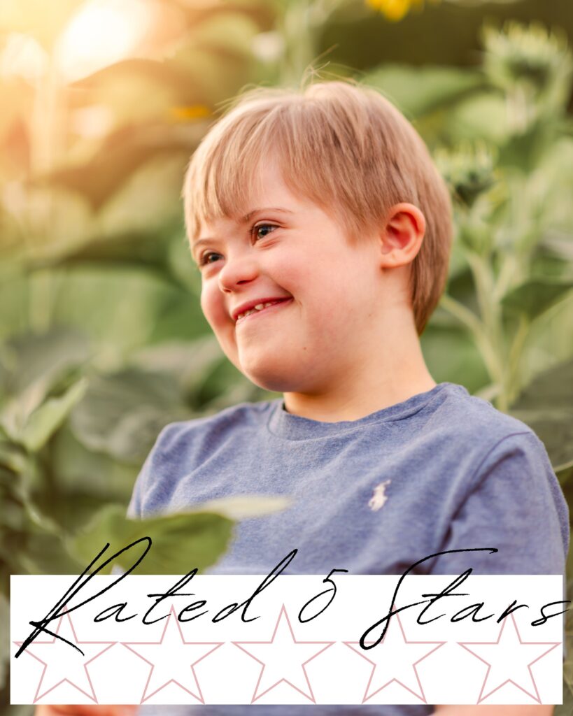 child posing in a sunflower field in Manhattan Kansas